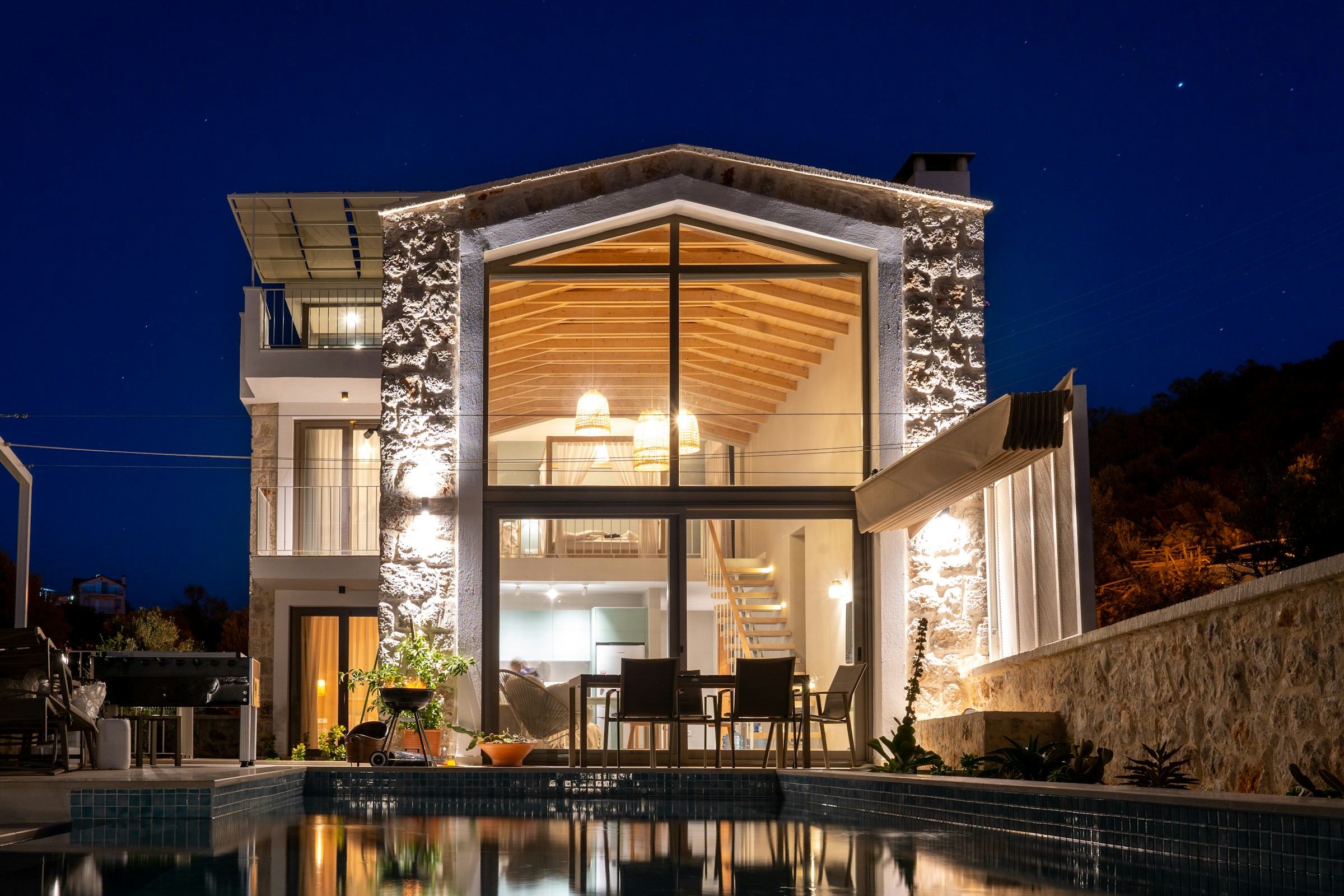 Warm illuminated entrance to a contemporary home